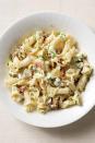 <p>Mix homemade white cream sauce in this pasta with toasted walnuts, blue cheese, and fresh chives.</p><p><strong><a href="https://www.countryliving.com/food-drinks/recipes/a33200/pasta-with-toasted-walnuts-blue-cheese-and-chives-recipe/" rel="nofollow noopener" target="_blank" data-ylk="slk:Get the recipe" class="link ">Get the recipe</a>.</strong><br></p>