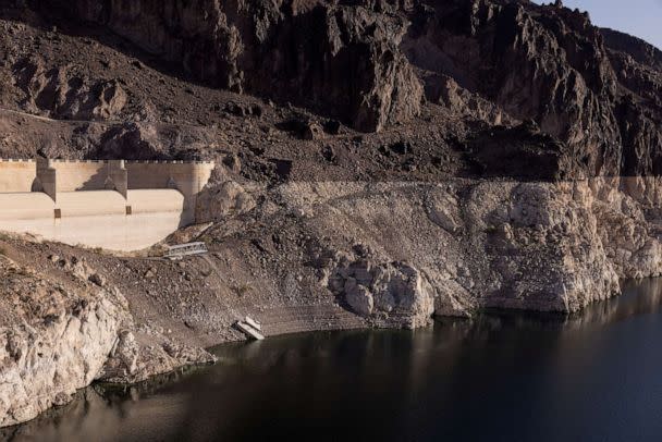 PHOTO: A dry spillway at Hoover Dam, and stairs ending on a cliff are seen next to the growing ring around Lake Mead, where water levels have declined dramatically, in Boulder City, Nev., April 17, 2022. (Caitlin Ochs/Reuters, FILE)