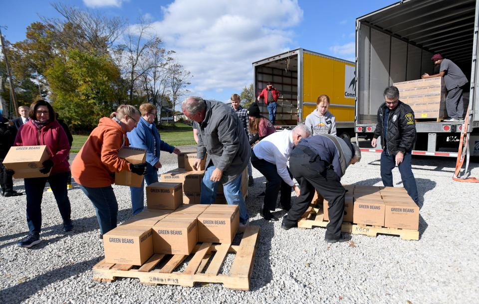 Alliance native Lionel Grimes, a member of the Black 14 from the University of Wyoming football team, partnered with the Church of Jesus Christ of Latter-day Saints to distribute donations to food pantries all over the country. They stopped Friday at the Alliance Community Food Pantry.