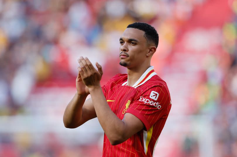 Trent Alexander-Arnold applauds the Anfield crowd following Liverpool's final game of the season against Wolves