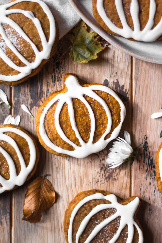 <p>The Banana Diaries</p><p>Easy and delicious vegan pumpkin sugar cookies with a simple vanilla icing! Completely gluten free and dairy free, these cookies are fun to make and perfect for the holidays!</p><p><strong>Get the recipe: <a href="https://thebananadiaries.com/vegan-pumpkin-sugar-cookies/" rel="nofollow noopener" target="_blank" data-ylk="slk:Vegan Pumpkin Sugar Cookies;elm:context_link;itc:0;sec:content-canvas" class="link rapid-noclick-resp"><em>Vegan Pumpkin Sugar Cookies</em></a></strong></p>
