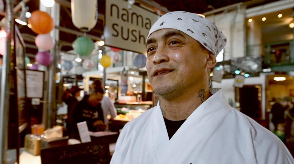 Roberto 'Rob' Katindig outside his Central Market stand Nama Sushi.