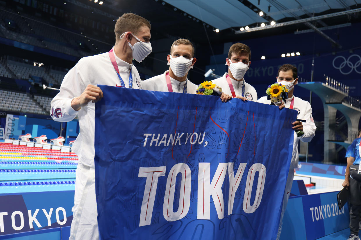 TOKYO, JAPAN - AUGUST 1:  Ryan Murphy, Michael Andrew, Caeleb Dressel and Zach Apple of the United States with a T