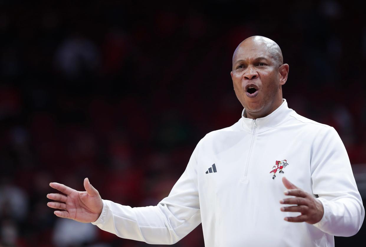 U of L head coach Kenny Payne instructs his players against Arkansas State at the Yum Center in Louisville, Ky. on Dec. 13, 2023.