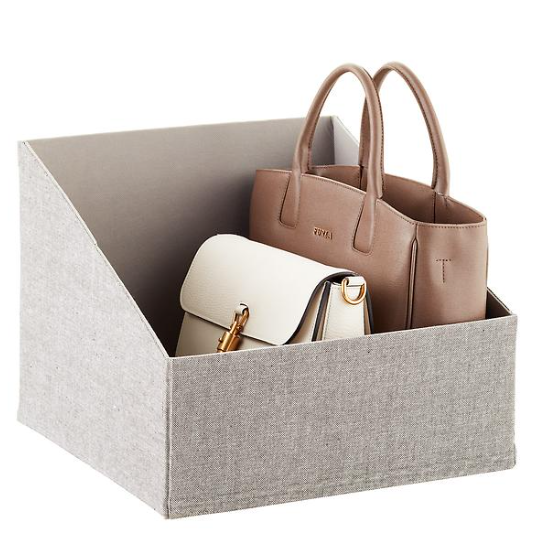 Cloth handbag storage bin.