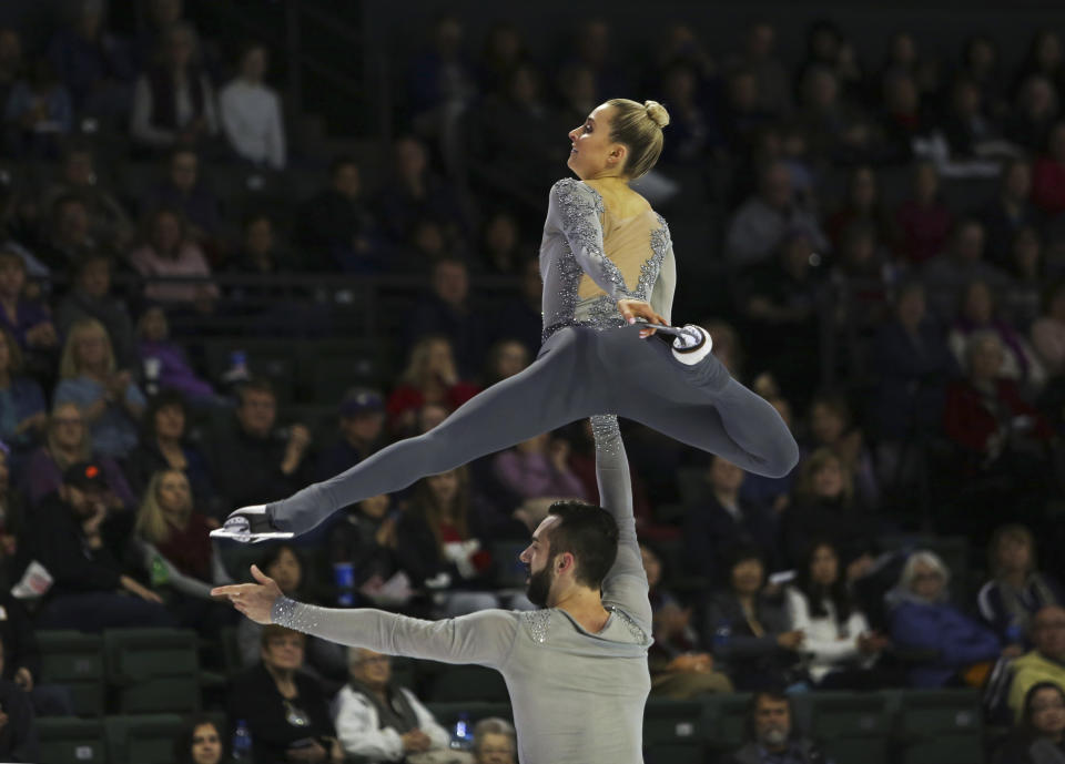 Ashley Cain and Timothy Leduc perform during the pair's free skating program at Skate America, Saturday, Oct. 20, 2018, in Everett, Wash. (Olivia Vanni/The Herald via AP)