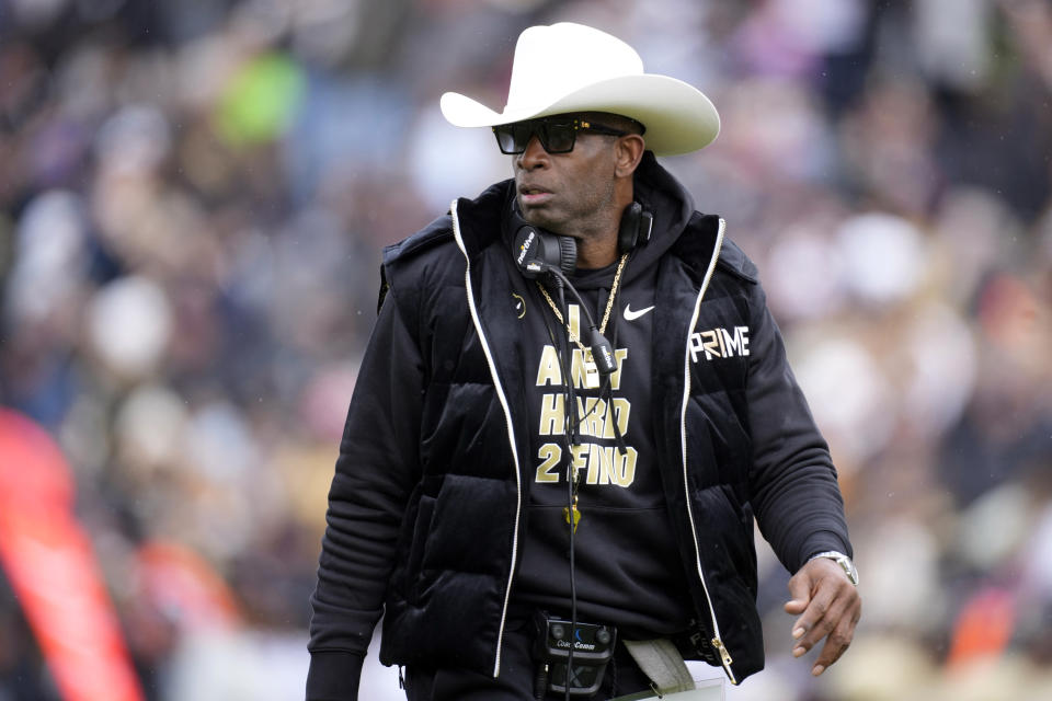 FILE - Colorado head coach Deion Sanders looks on in the first half of the team's spring practice NCAA college football game, April 22, 2023, in Boulder, Colo. Sanders is scheduled to undergo surgery Friday, June 23, for a blood clot in each leg, the University of Colorado football coach revealed in a video he posted. (AP Photo/David Zalubowski, File)