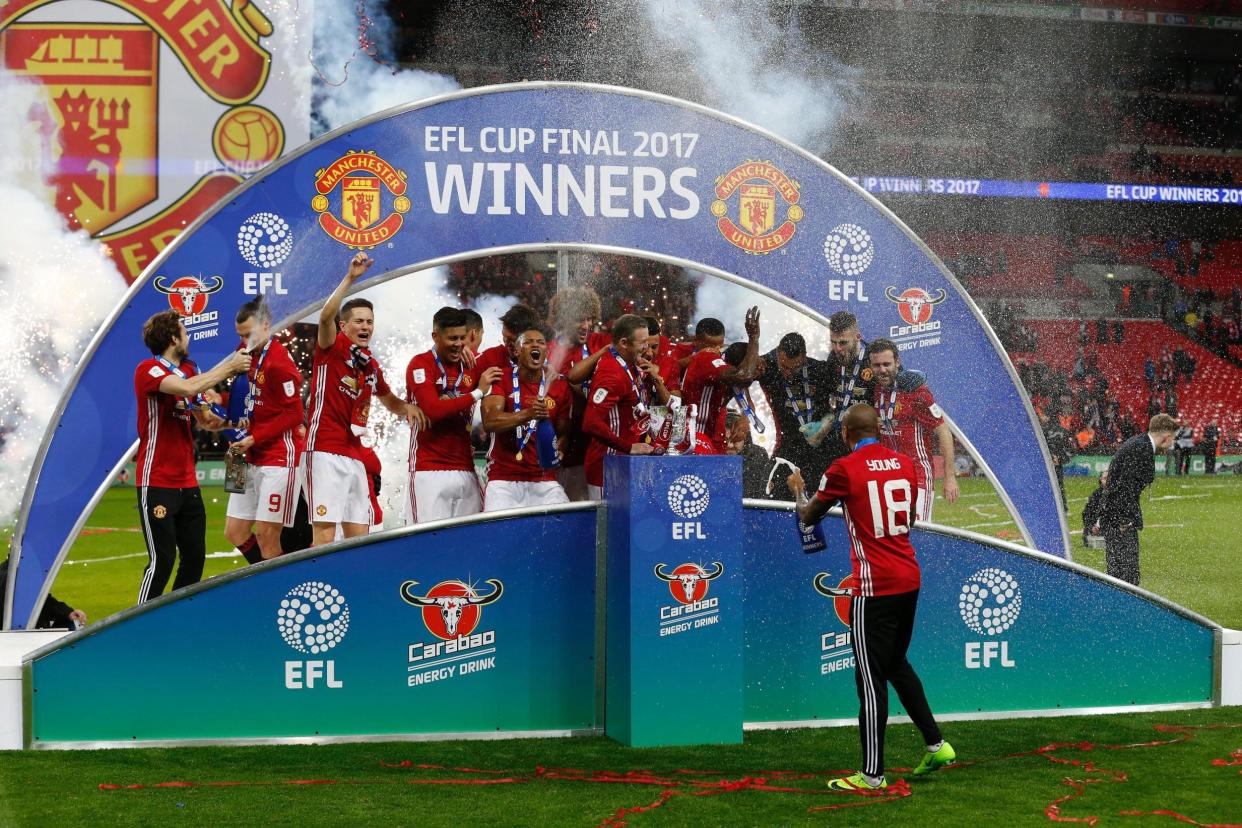 Holders: Manchester United begin their defence of the EFL Cup against Burton: AFP/Getty Images