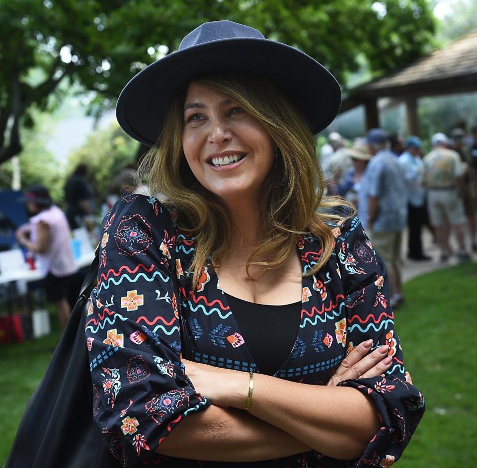 Democratic candidate for Nevada's 2nd Congressional District Mercedes Krause talks with supporters while attending the Douglas Democrats Election Kick Off and Fundraising BBQ at Mormon Station Park in Genoa on July 30, 2022.