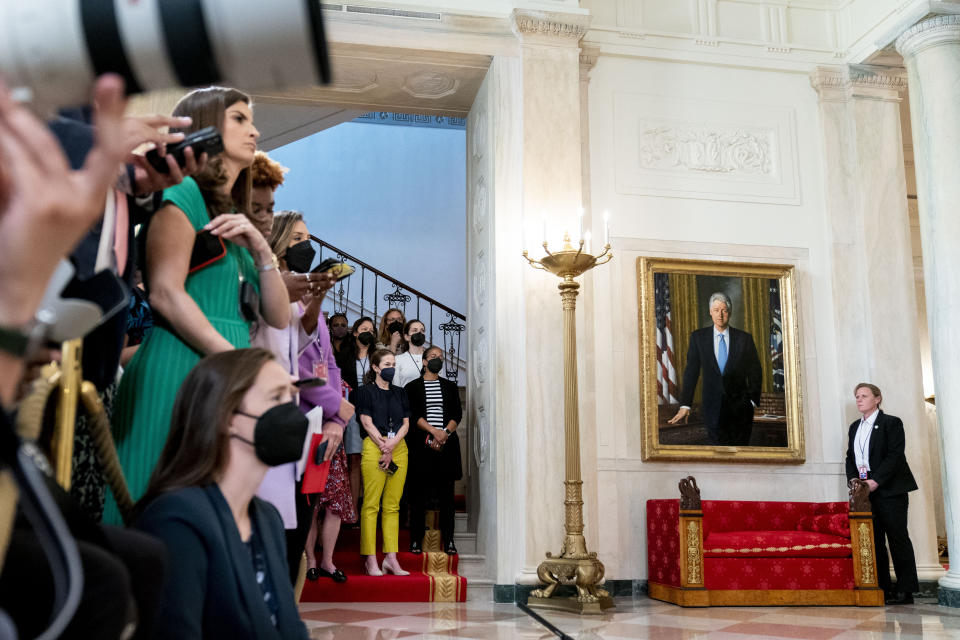 Members of the media, White House domestic policy adviser Susan Rice, center right, and other White House staff listen as President Joe Biden speaks at the White House in Washington, Friday, June 24, 2022, after the Supreme Court overturned Roe v. Wade. (AP Photo/Andrew Harnik)