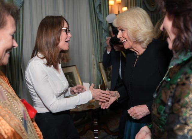 The Queen meeting Susie Dent at The Queen’s Reading Room charity reception