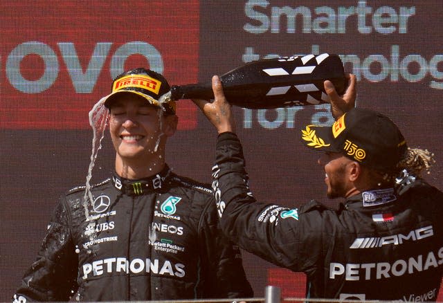 Lewis Hamilton sprays team-mate George Russell with champagne 