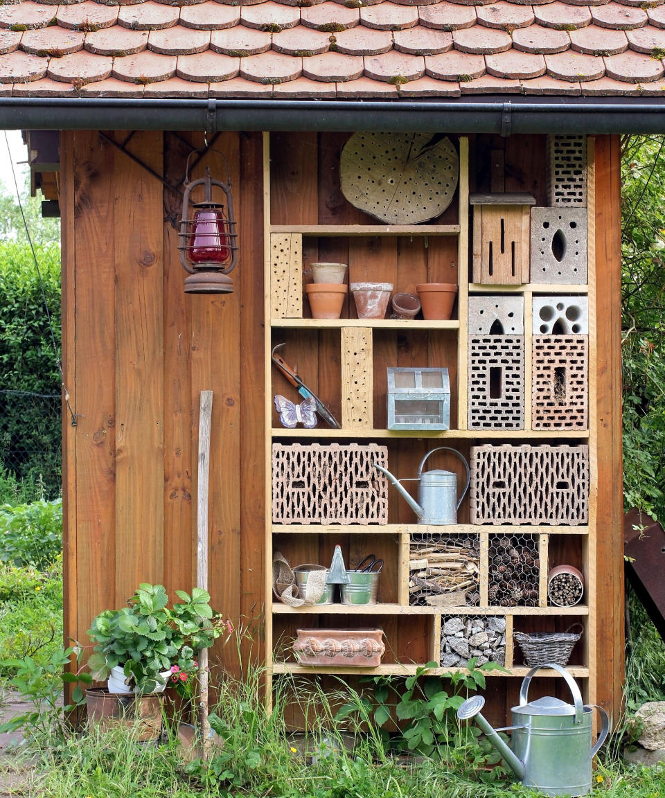 1. Build a bug hotel against a shed wall