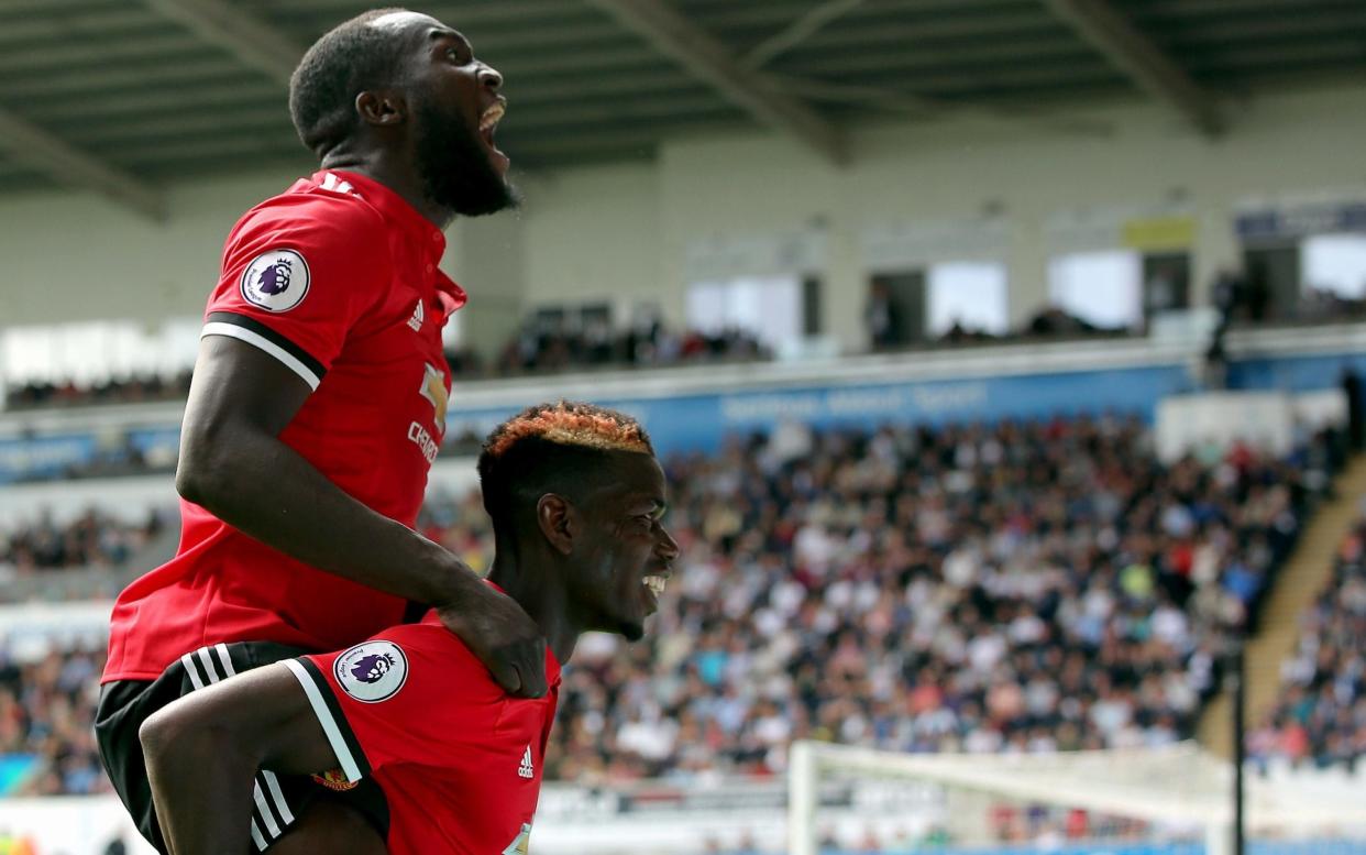 Paul Pogba and Romelu Lukaku celebrate - EPA