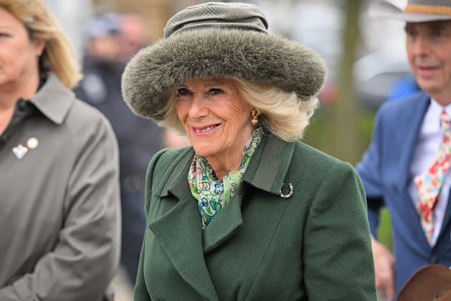 <p>Leon Neal/Getty </p> Queen Camilla at the Cheltenham Festival on March 13, 2024