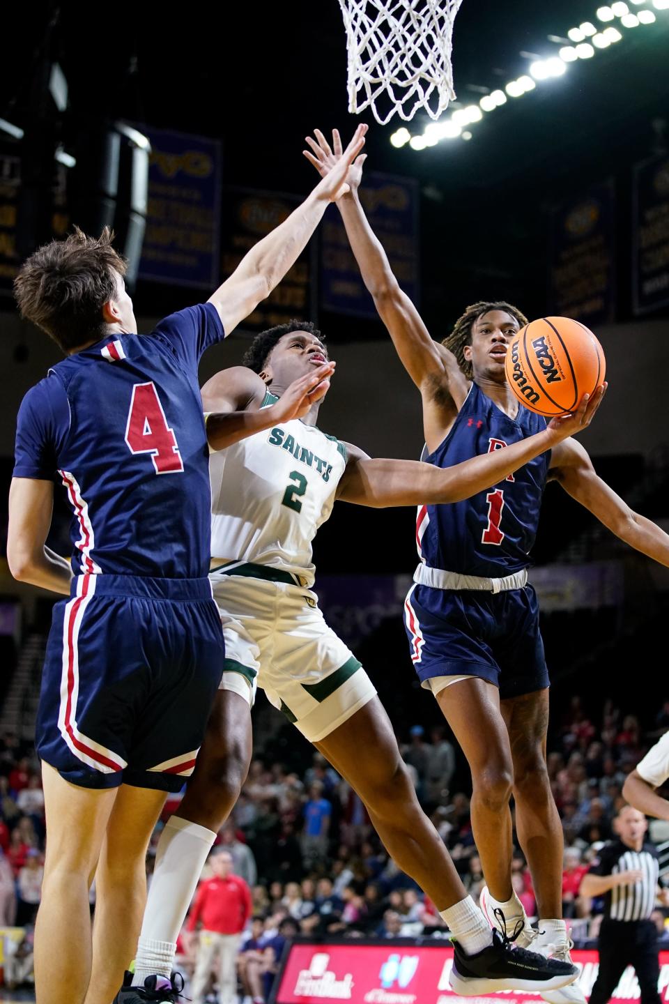 Briarcrest's Jaye Nash (2) shoots between Brentwood Academy's George Macintyre (4) and Drey Moss (1) during the third quarter of the DII-AA championship game at the Hooper Eblen Center in Cookeville, Tenn., Saturday, March 4, 2023.