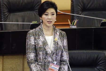 Ousted former Prime Minister Yingluck Shinawatra delivers her statement at the National Legislative Assembly meeting in Bangkok January 22, 2015. REUTERS/Chaiwat Subprasom