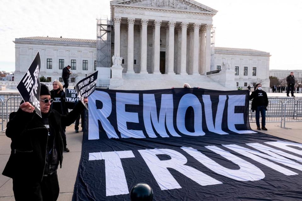 PHOTO: Anti-Trump demonstrators protest outside the U.S. Supreme Court as the court considers whether former President Donald Trump is eligible to run for president in the 2024 election, Feb, 8, 2024, in Washington. (Roberto Schmidt/AFP via Getty Images)