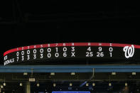 The scoreboard shows the score after a baseball game between the Washington Nationals and the New York Mets at Nationals Park, Tuesday, July 31, 2018, in Washington. The Nationals won 25-4. (AP Photo/Alex Brandon)