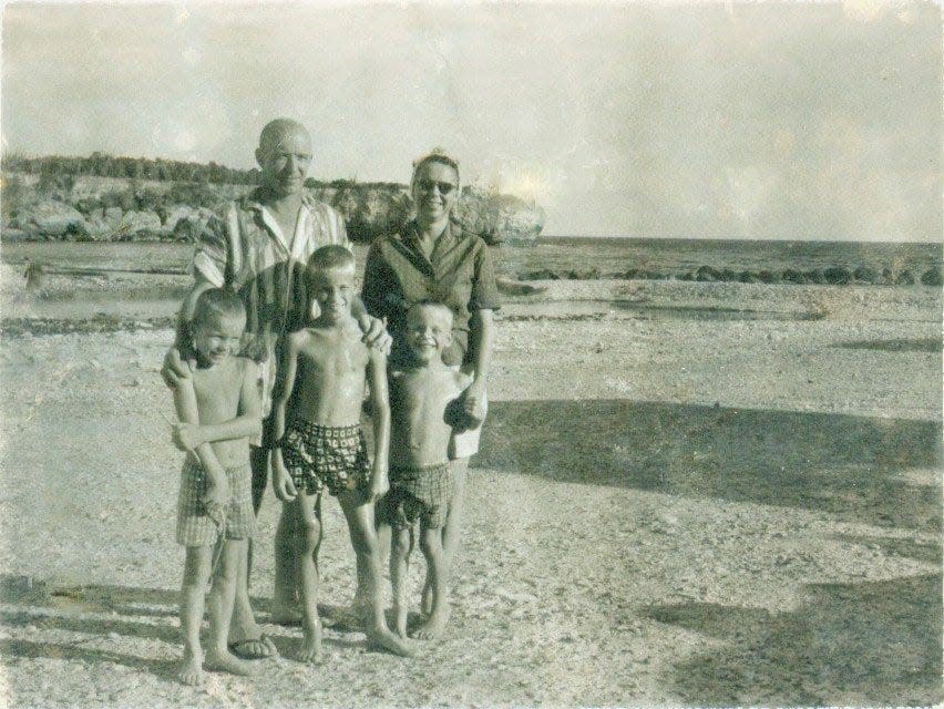 The Frailey family on the beach at the naval station at Guantanamo Bay in the early 1960s. Mike Frailey is the boy in the middle, with his brothers Gary (on left) and Duane. Behind them are their parents, Julius and Christine.