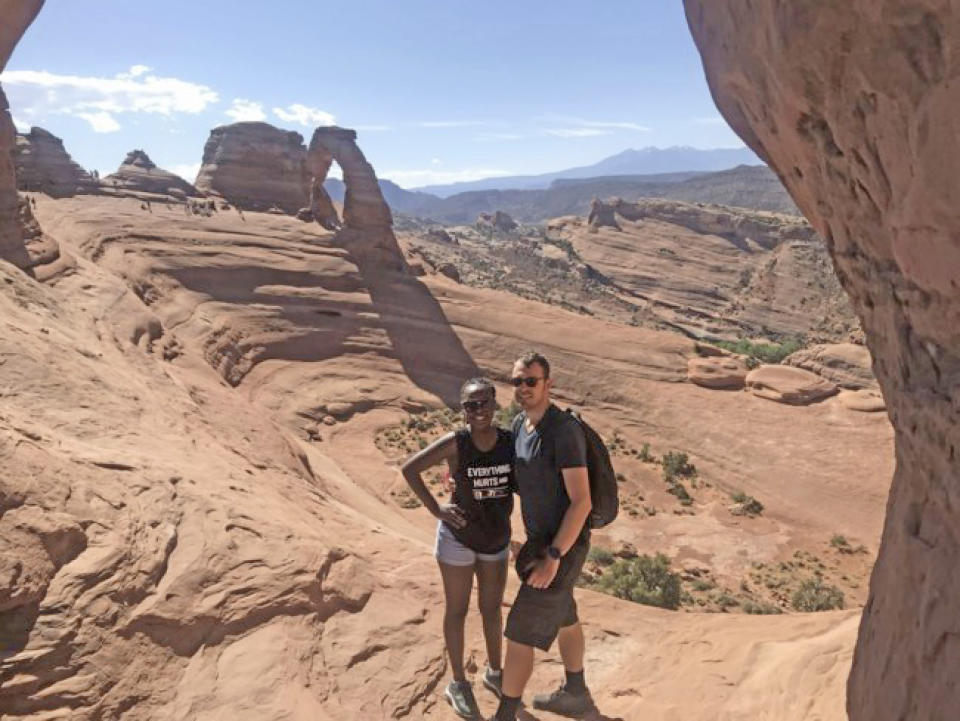 Esther Nakajjigo and Ludovic Michaud at Arches National Park in eastern Utah. This photo was taken hours before a gate swung into the couple's car, killing Nakajjigo. (Courtesy of Ludovic Michaud)