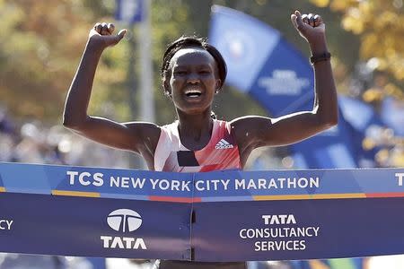 Mary Keitany of Kenya crosses the finish line to win the womens field of the 2016 New York City Marathon in Central Park in the Manhattan borough of New York City, New York, U.S. November 6, 2016. REUTERS/Mike Segar