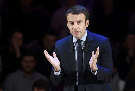 Emmanuel Macron, candidate in France's 2017 French presidential election, delivers an address for French nationals in London, Britain, February 21, 2017. REUTERS/Toby Melville