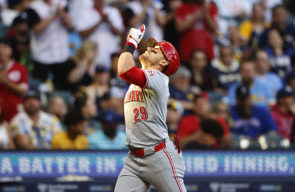 Cincinnati Reds' TJ Friedl gestures after his home run agains the Milwaukee Brewers during the third inning of a baseball game Friday, June 14, 2024, in Milwaukee. (AP Photo/Jeffrey Phelps)