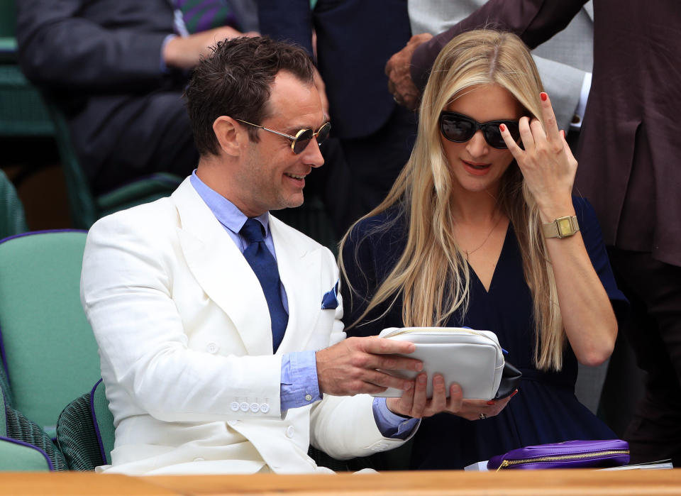 Royal Box guests Jude Law and Phillipa Coan on day eleven of the Wimbledon Championships at the All England Lawn Tennis and Croquet Club, Wimbledon.