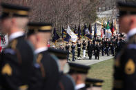 Brazil's President Jair Bolsonaro arrives during ceremonies to lay a wreath at the Tomb of the Unknown Soldier at Arlington National Cemetery during his visit to Washington in Arlington, Virginia, U.S., March 19, 2019. REUTERS/Jonathan Ernst