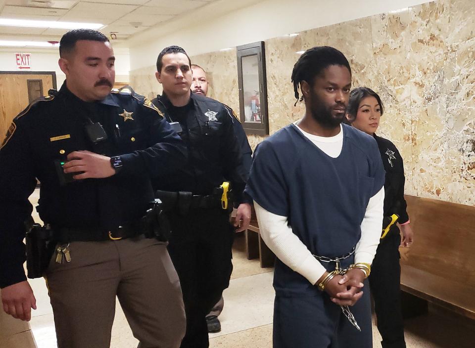 Lubbock County Sheriff's Deputies escort Miko Butler, 31, out of the 364th District Court on Friday after a District Judge sentenced him to 70 years in prison for stabbing two deputies in 2020.