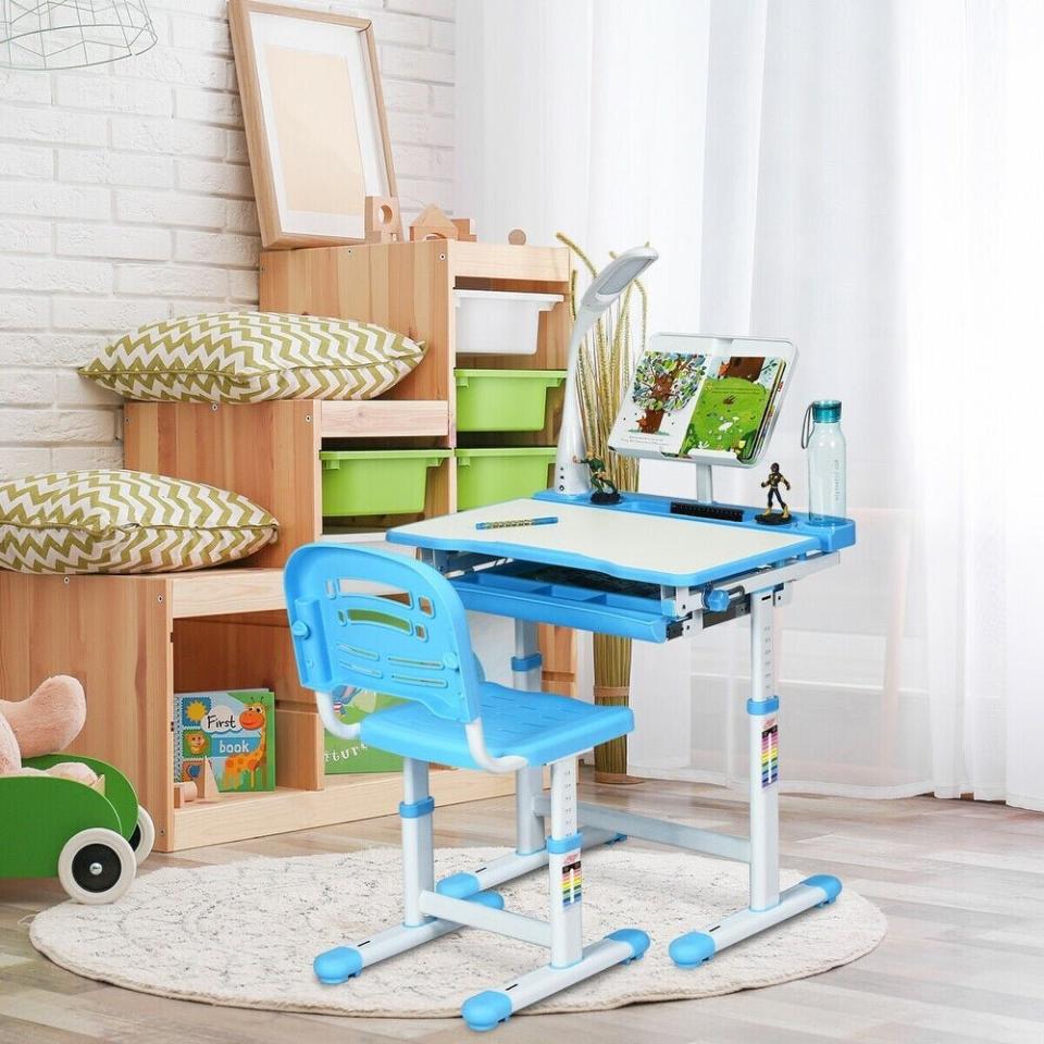 This study desk has just about everything your kiddo could need to get through the school day &mdash; including  a pull-out drawer, bookstand and LED lamp. The chair and desk are both adjustable. <a href="https://fave.co/32Kjf8U" target="_blank" rel="noopener noreferrer">Find them for $191 at Overstock</a>.