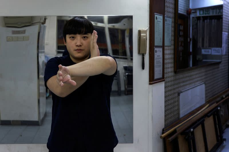 The Wider Image: Fifty years on, Bruce Lee's legacy squares up to modern life in Hong Kong