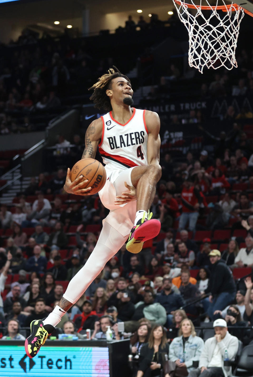 Portland Trail Blazers forward Greg Brown III goes up for a dunk against the Houston Rockets during the second half of an NBA basketball game in Portland, Ore., Friday, Oct. 28, 2022. (AP Photo/Steve Dipaola)