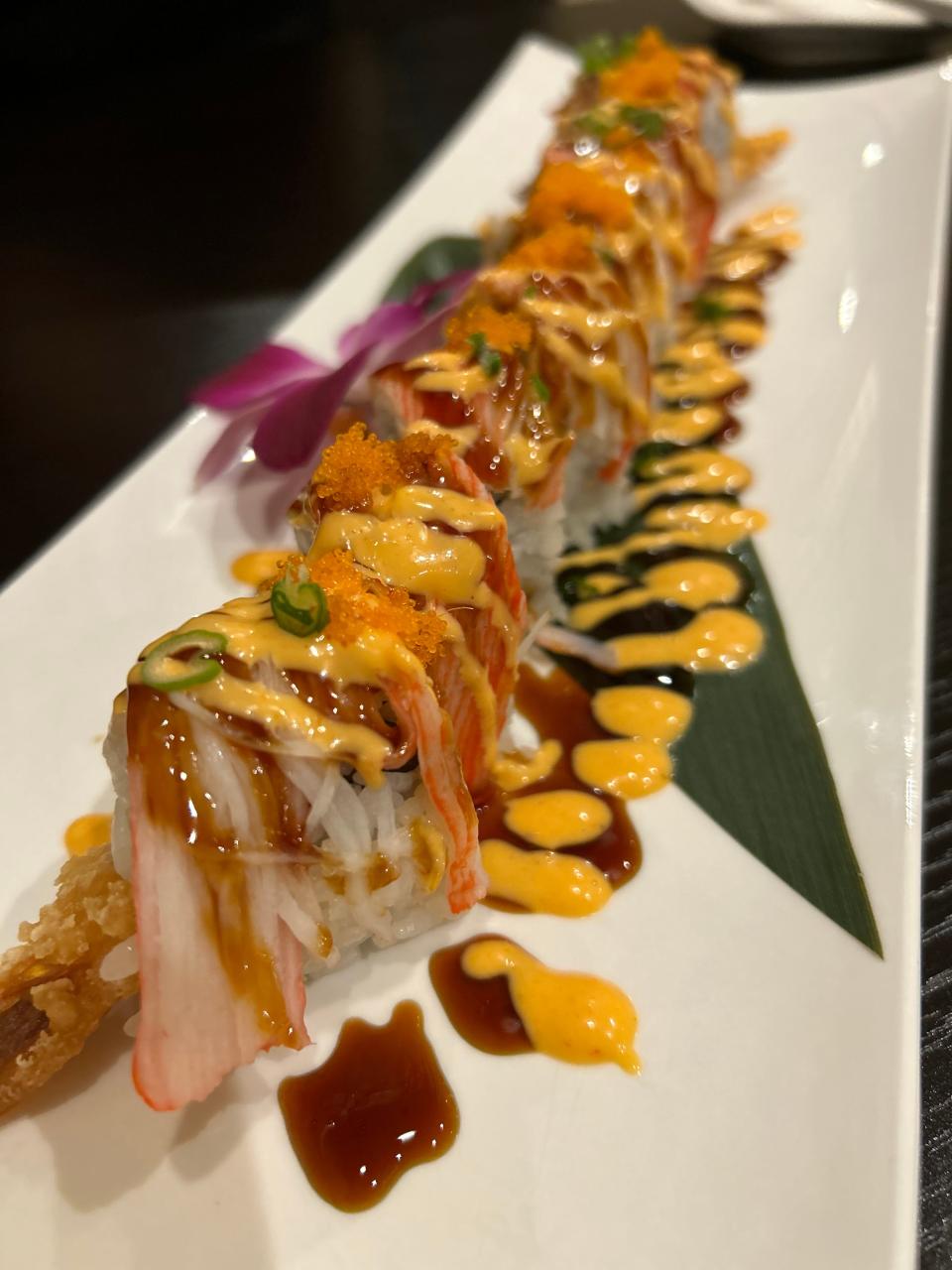 The Angel Roll at Ki Asian Cuisine features shrimp tempura, cream cheese, crab meat, spicy mayor, eel sauce, scallions and masago fish eggs.