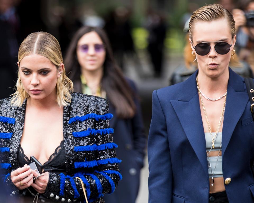 While Cara Delevingne walked the Balmain fashion show during Paris Fashion Week on Friday, rumored girlfriend Ashley Benson looked on from the audience.