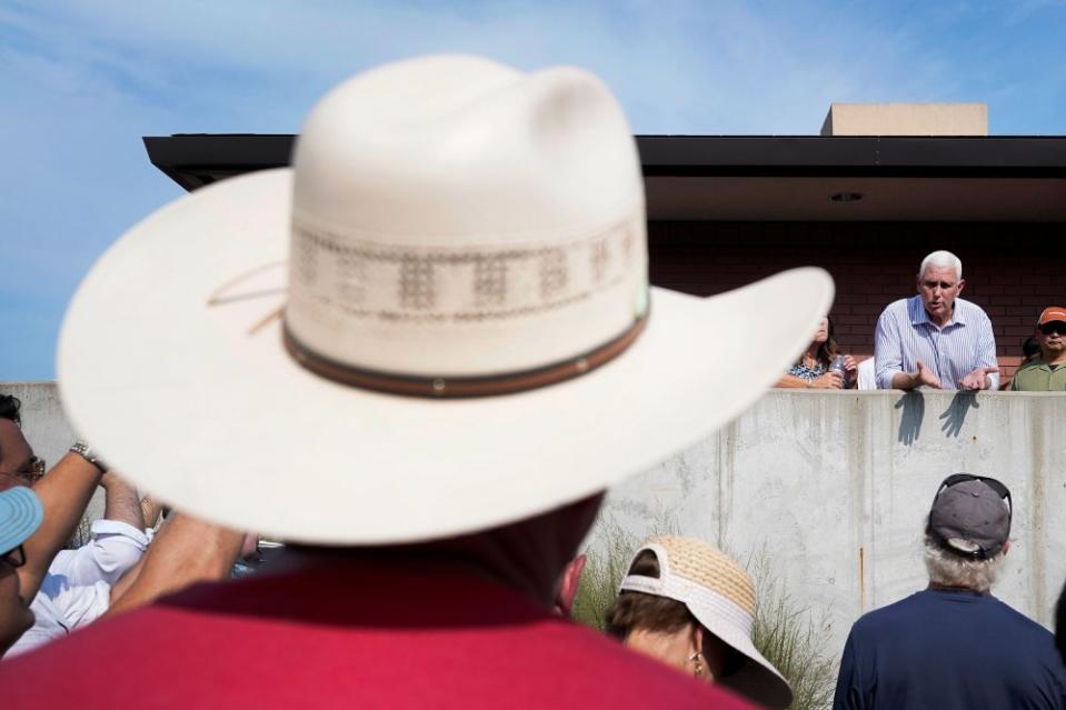 Republican presidential candidate former Vice President Mike Pence speaks to fairgoers on Aug. 10.<span class="copyright">Charlie Neibergall—AP</span>