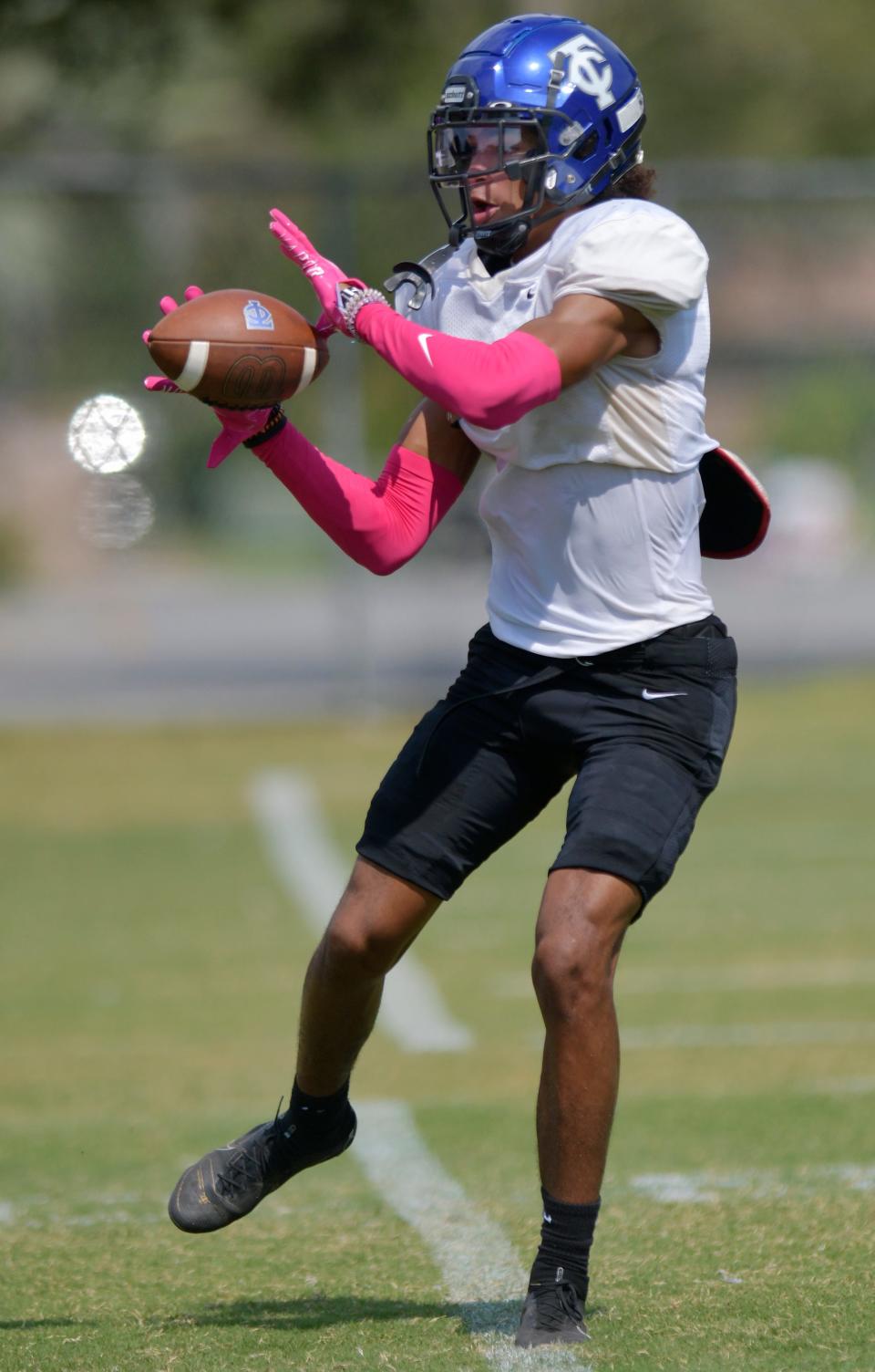 Wide receiver Seth Bialek catches a pass during practice at Trinity Christian. The Conquerors, two-time defending state champions, defeated Raines last week to remain atop the power rankings.