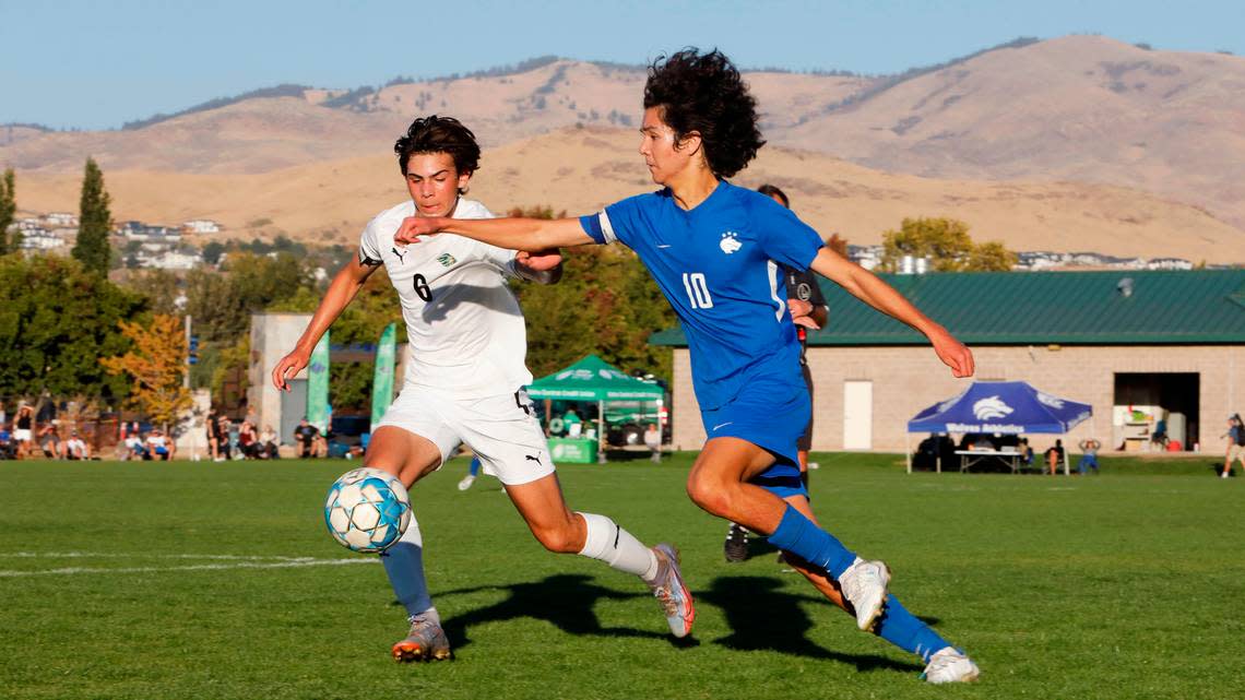 Timberline senior Kai Hatten, right, was voted the 5A boys soccer state player of the year by Idaho coaches.