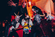 <p>Kaitlyn Dever is all good, posing next to a terrifying crew, during Halloween Horror Nights at Universal Studios Hollywood on Oct. 10.</p>