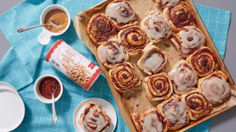 tray of frosted cinnamon rolls