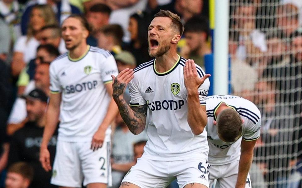 Leeds United's Liam Cooper reacts to going 3-1 down during the Premier League match between Leeds United and Tottenham Hotspur at Elland Road on May 28, 2023 in Leeds, England - Getty Images/Alex Dodd