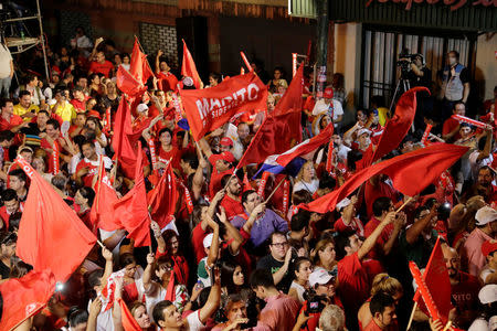 Supporters of Paraguay’s newly-elected President Mario Abdo Benitez of the Colorado Party celebrate in Asuncion, Paraguay, April 22, 2018. REUTERS/Jorge Adorno