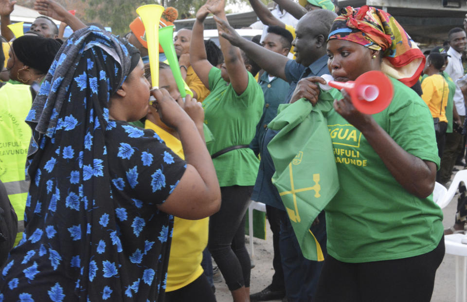 Ruling party Chama Cha Mapinduzi party supporters celebrate Thursday, Oct. 29, 2020, in Dodoma, Tanzania, after the party emerged victoriously in the Wednesday presidential vote. The main opposition leader Tundu Lissu has rejected the result, and cited alleged widespread irregularities in the election, saying that whatever happened wasn't an election and was like "spitting in the face of democracy." (AP Photo)