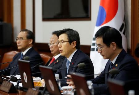 South Korean Prime Minister and the acting President Hwang Kyo-ahn speaks during a cabinet meeting at the Goverment Complex in Seoul, South Korea, December 9, 2016. REUTERS/Kim Hong-Ji