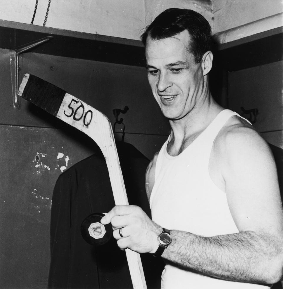 <p>Gordie Howe was known as “Mr. Hockey,” and not without reason: he won four Stanley Cup championships with the Detroit Red Wings and only finally retired at age 58. The ever-durable Howe died at age 88 on June 10. — (Pictured) Gordie Howe #9 of the Detroit Red Wings stands in a locker room in his undershirt as he holds a hockey puck and stick labeled 500, in honor of his 500th career goal, which came during a game against the New York Rangers on March 14, 1962 at the Madison Square Garden in New York, New York. (Bruce Bennett Studios/Getty Images) </p>