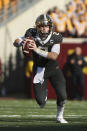 FILE - In this Oct. 26, 2019, file photo, Minnesota quarterback Tanner Morgan runs with the ball during an NCAA college football game against Maryland in Minneapolis.Fans of Minnesota's Golden Gophers are enjoying football success the team hasn't seen in decades, and daring to dream of a trip to Pasadena. (AP Photo/Stacy Bengs,Fie)