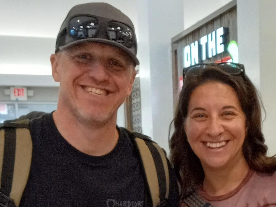 Couple posing for a photo at a mall