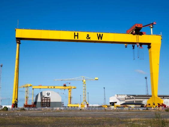 The shipyard’s yellow cranes have been a staple feature of Belfast’s skyline for a generation (PA)