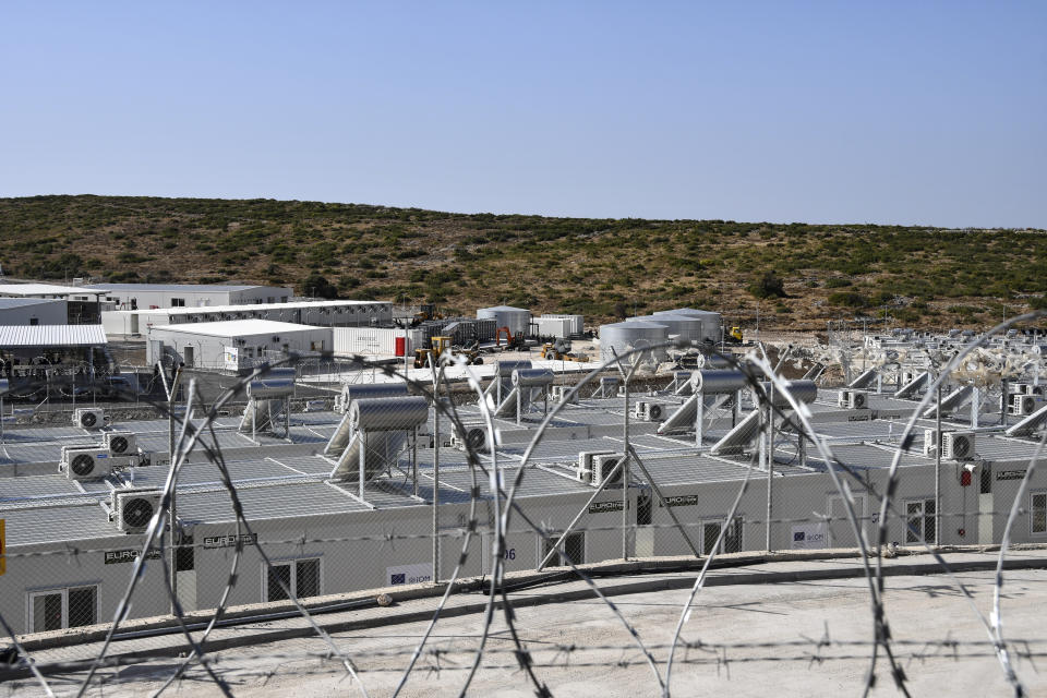 A view of the new multi-purpose reception and identification migrant centre which was constructed near Vathy town, on the eastern Aegean island of Samos, Greece, Saturday, Sept. 18, 2021. The centre constructed following a 121 million euros agreement between the European Commission and the Greek Ministry of Migration and Asylum, an amount granted to Greece for the construction of 3 reception centres on the islands of Samos, Kos, and Leros. (AP Photo/Michael Svarnias)